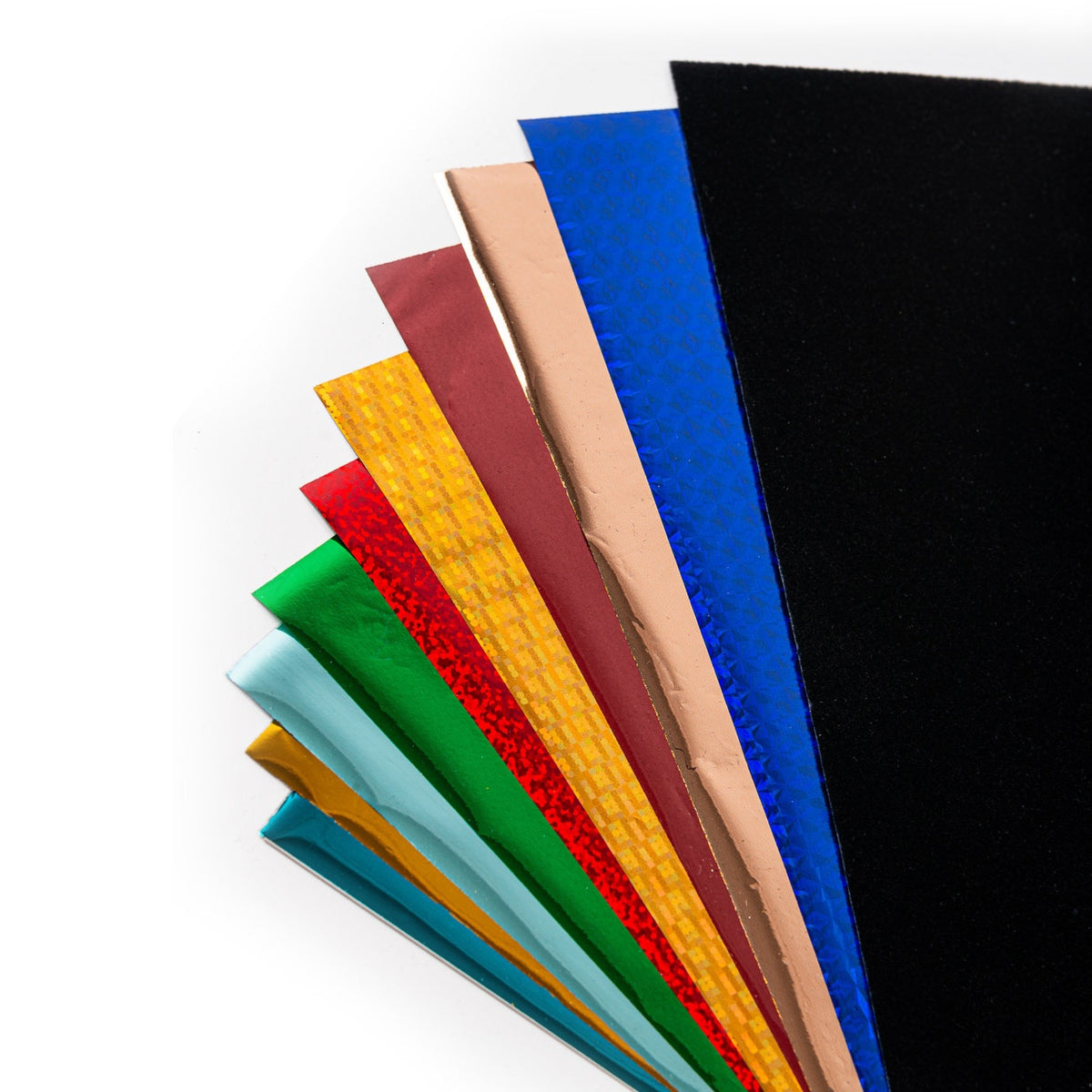 Close-up of vibrant holographic and metallic foil craft sheets fanned out on a white background.