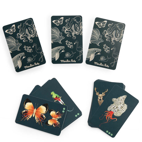 Moulin Roty Tout Autour du Monde animal seek and find card game with illustrated butterflies, squid, and deer.