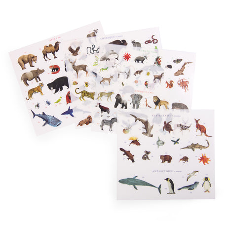 Four sheets of illustrated animal rub-on transfers for different continents including Asia, America, and Australasia.