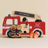 Wooden red toy fire engine with ladder, two firefighter figurines, and two small wooden fire cutouts.
