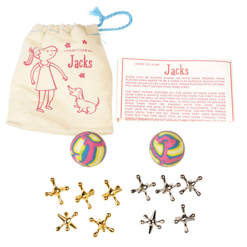 A vintage jacks game set includes a drawstring bag with a girl and dog illustration, a how-to-play card, two colorful balls, and ten metal jacks.