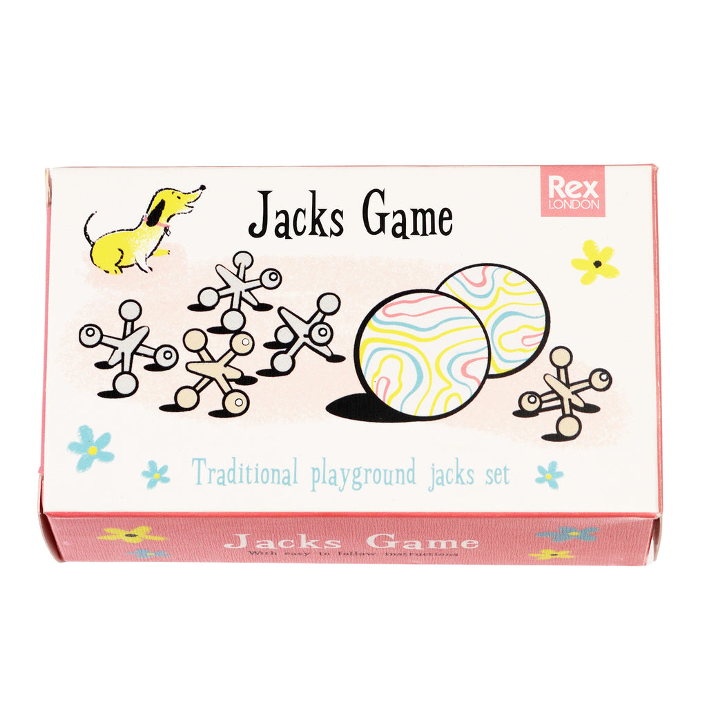 Box for a "Jacks Game," featuring classic jacks, colorful balls, and a cartoon dog. The design is playful with floral accents and light pastel tones.