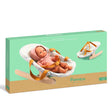 Djeco Pomea Collection doll rocker toy box featuring a baby doll in a patterned fabric bouncer with wooden base.