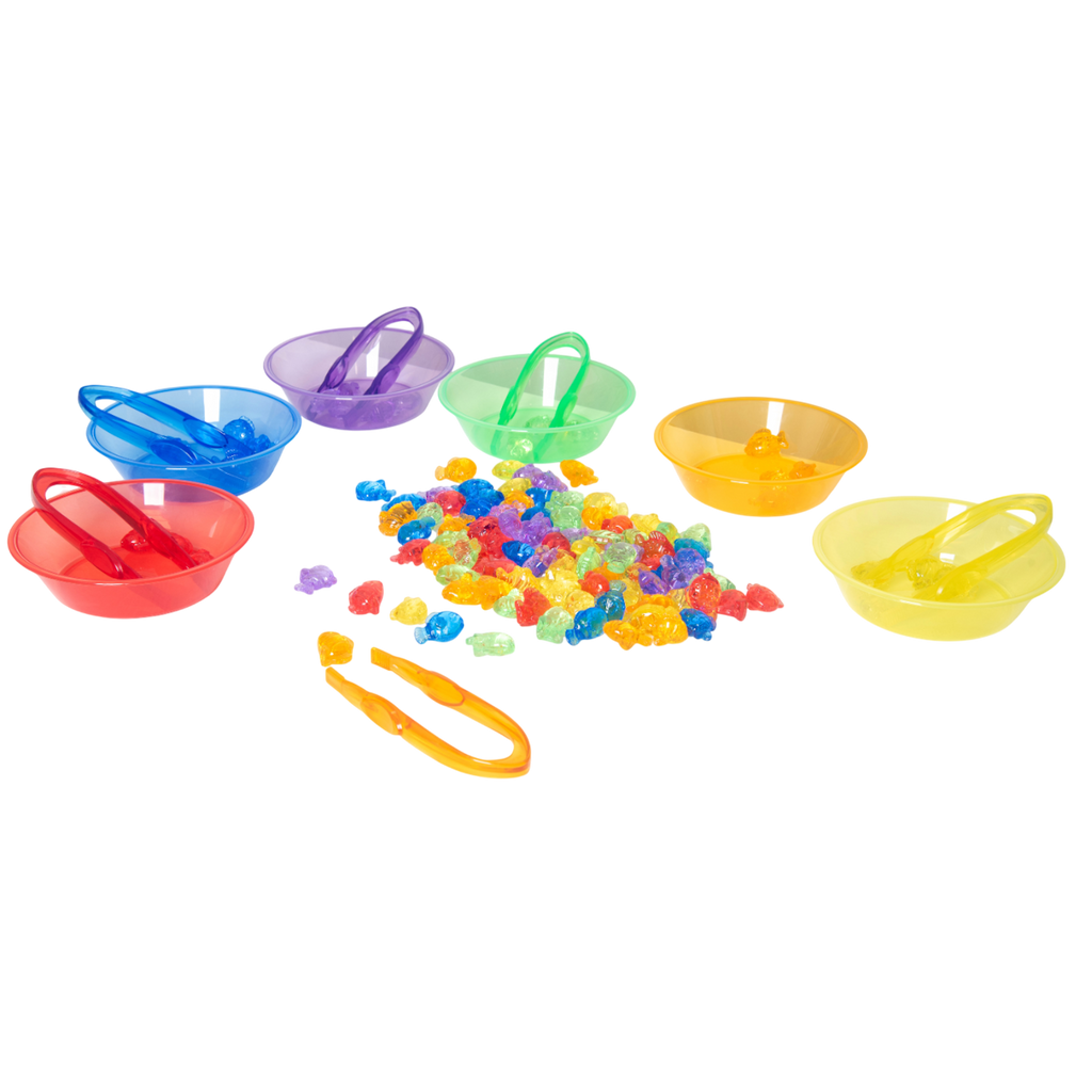 A set of brightly colored see-through fish figures, designed for sensory play, counting, sorting, and color recognition activities.