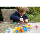 A set of spinning sensory toys with clear, colorful discs that create visual effects, ideal for exploring color mixing and motion.