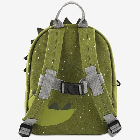 The back of a green dinosaur toddler backpack with adjustable gray shoulder straps and a chest buckle.