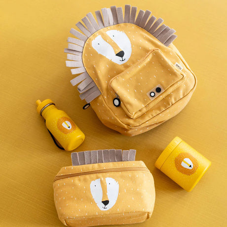 Yellow lion-themed school gear set including a backpack, pencil case, water bottle, and snack container.