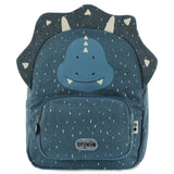 Blue triceratops backpack with a speckled pattern, a smiling dinosaur face, horns, and a front pocket.