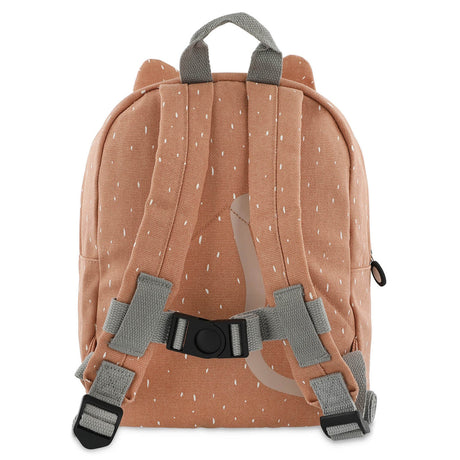 The back view of a pink children's backpack with white specks, gray shoulder straps, and a chest strap.