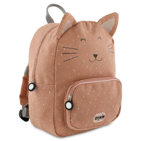A dusty pink cat backpack with white speckles, pointy ears, a stitched whiskers face, and a front pocket.
