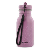 The back of a purple kids' water bottle with white specks, a black wrist strap, and the "trixie" logo.