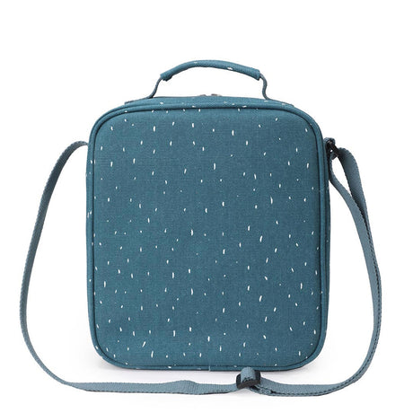 The back of a teal insulated lunch bag with a white speckled pattern, a top handle, and a shoulder strap.