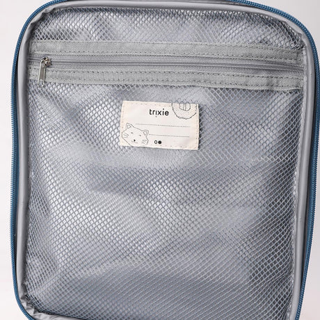 Inside of a lunch bag showing a grey zippered mesh pocket and a Trixie name tag with a cat drawing.