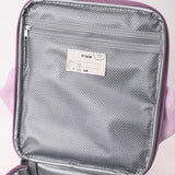 Inside of a purple lunch bag showing a grey zippered mesh pocket and a Trixie name tag with a cat drawing.