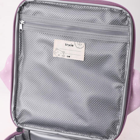 Inside of a purple lunch bag showing a grey zippered mesh pocket and a Trixie name tag with a cat drawing.