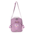Purple kids lunch bag featuring a cute peacock face, wings, a top handle, and a long shoulder strap.