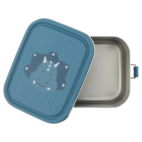 An open stainless steel lunch box next to its blue lid featuring a cartoon triceratops face.