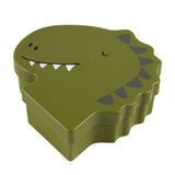 Green kids lunch box shaped like a dinosaur's head, featuring a friendly face and spikes on the lid.
