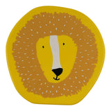 Top view of a yellow lunch box lid featuring a cartoon lion face.