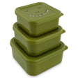 Three green square dinosaur-themed snack boxes stacked on top of each other, on a white background.