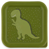 Top view of a square green snack box lid featuring a cartoon dinosaur with a white speckled pattern.