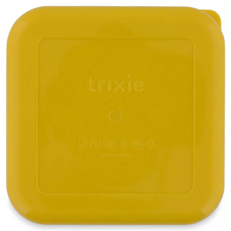 The back of a square, yellow snack box with rounded corners and an embossed Trixie logo.