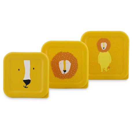 A set of three nesting yellow snack boxes in graduating sizes, each featuring a different lion design.