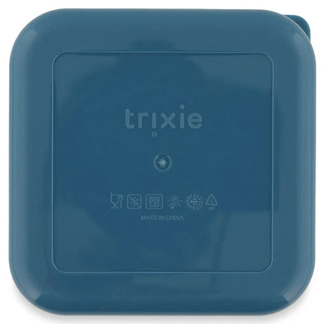 The back of a square, teal snack box with rounded corners and an embossed Trixie logo.