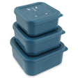 Three blue square dinosaur-themed snack boxes stacked on top of each other, on a white background.