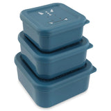 Three blue square dinosaur-themed snack boxes stacked on top of each other, on a white background.