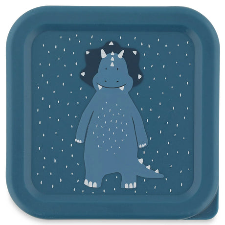 Top view of a square blue snack box lid featuring a cartoon triceratops with white speckles.