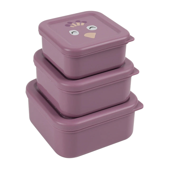 Three purple, square nesting snack boxes stacked on top of each other, with a peacock face on the top lid.