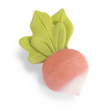 A pink and white radish-shaped baby teething toy with three green leaves on a white background.
