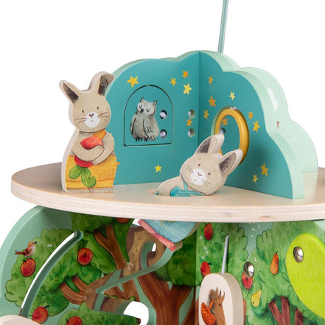 Wooden multi-activity garden toy featuring rabbit figures, an owl illustration, and orchard details.