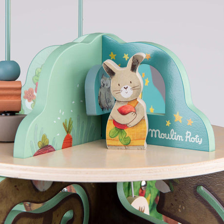 Moulin Roty wooden rabbit activity toy garden theme.