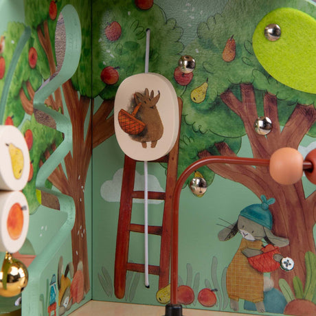 Wooden activity cube toy garden illustration with bead maze and animal figures.