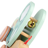 Trois Petits Lapins wooden butterfly pull-along toy with gold bell.