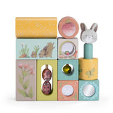 Trois Petits Lapins wooden stack up activity cubes with rabbit hedgehog and ladybug illustrations.