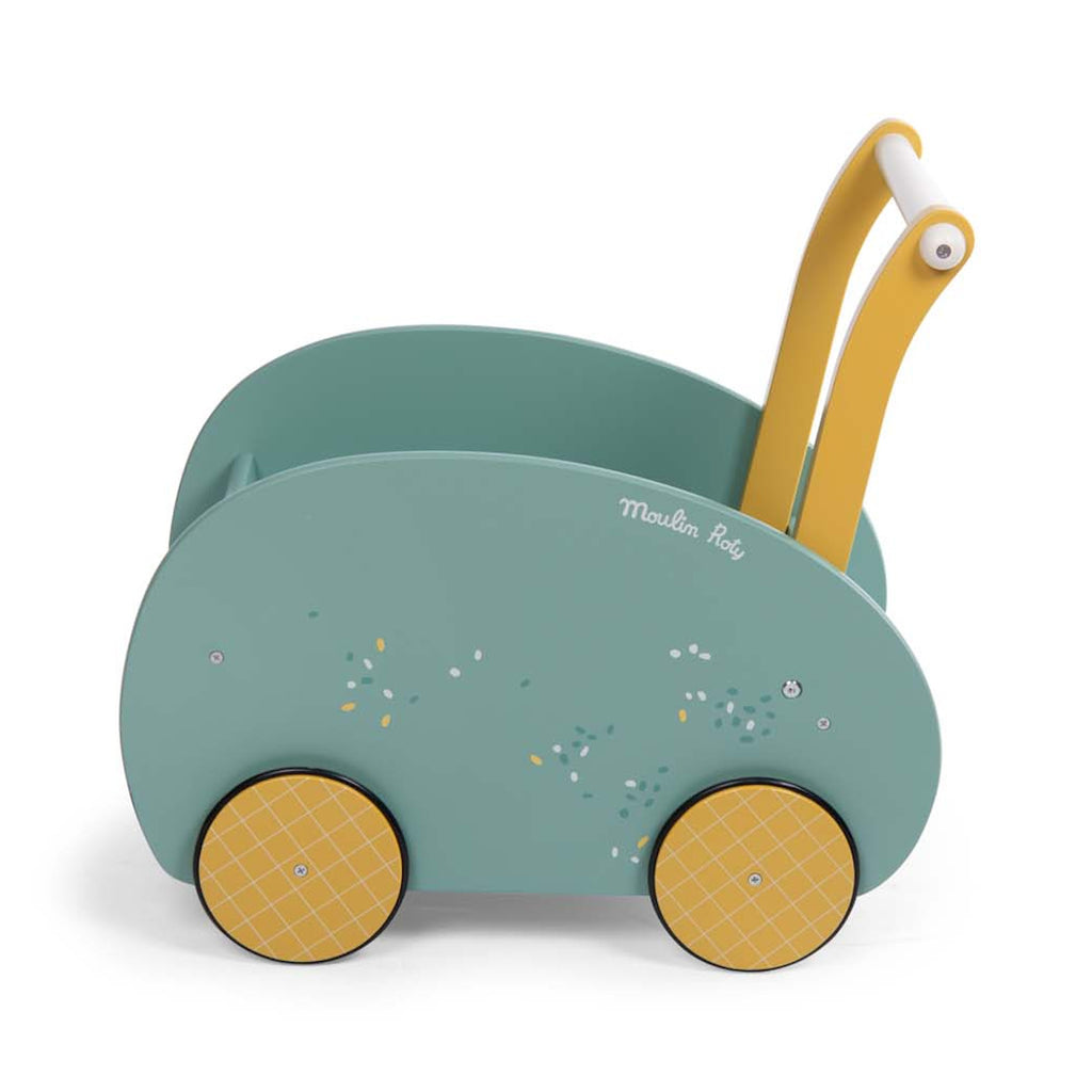 Toy push cart with a teal body and rounded sides, features yellow handles and wheels. Decorated with small sprinkles and a playful, modern design.
