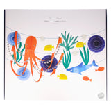 Packaging for Meri Meri Giant Honeycomb Garland with Under the Sea ocean creatures and seaweed cutouts.