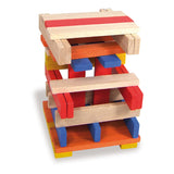 Vilac Batibloc wooden building blocks stacked in a colorful tower with red, blue, and yellow pieces.