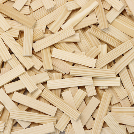 Pile of natural Vilac Batibloc wooden building blocks and construction planks.