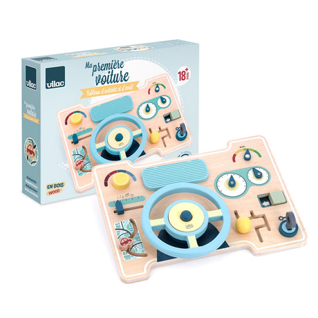 Vilac wooden activity car dashboard toy for toddlers with steering wheel and gear shift and its original box.