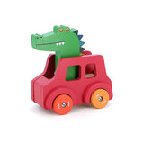 Wooden Vilac crocodile beep car toy with a green alligator driver in a red vehicle and orange wheels.