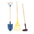 Set of colorful kids' gardening tools including a blue shovel, yellow rake, and purple hoe with wooden handles.