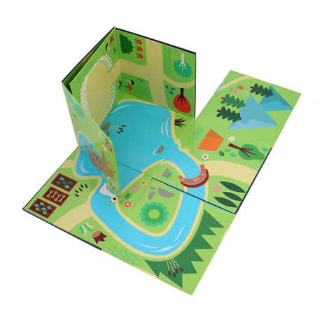 Pop-up folding playmat box featuring a colorful illustrated farm and countryside map on a white background.