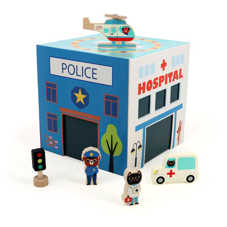 Wooden rescue play set with a police and hospital box, helicopter, ambulance, and animal character figures.