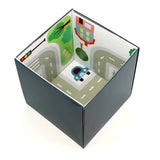 Open dark blue storage box with an illustrated interior featuring roads, a car, trees, and buildings.