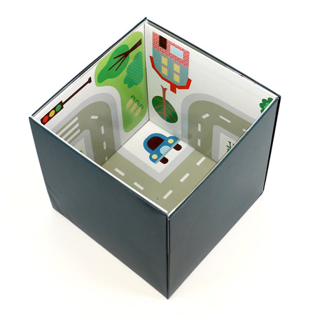 Open dark blue storage box with an illustrated interior featuring roads, a car, trees, and buildings.