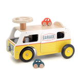 Yellow and white Vilac wooden garage truck toy with a steering wheel and two small toy cars for toddlers.